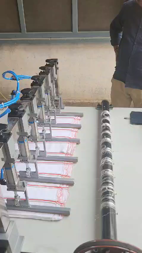 Actuator-row closeup on the thread-pulling machine