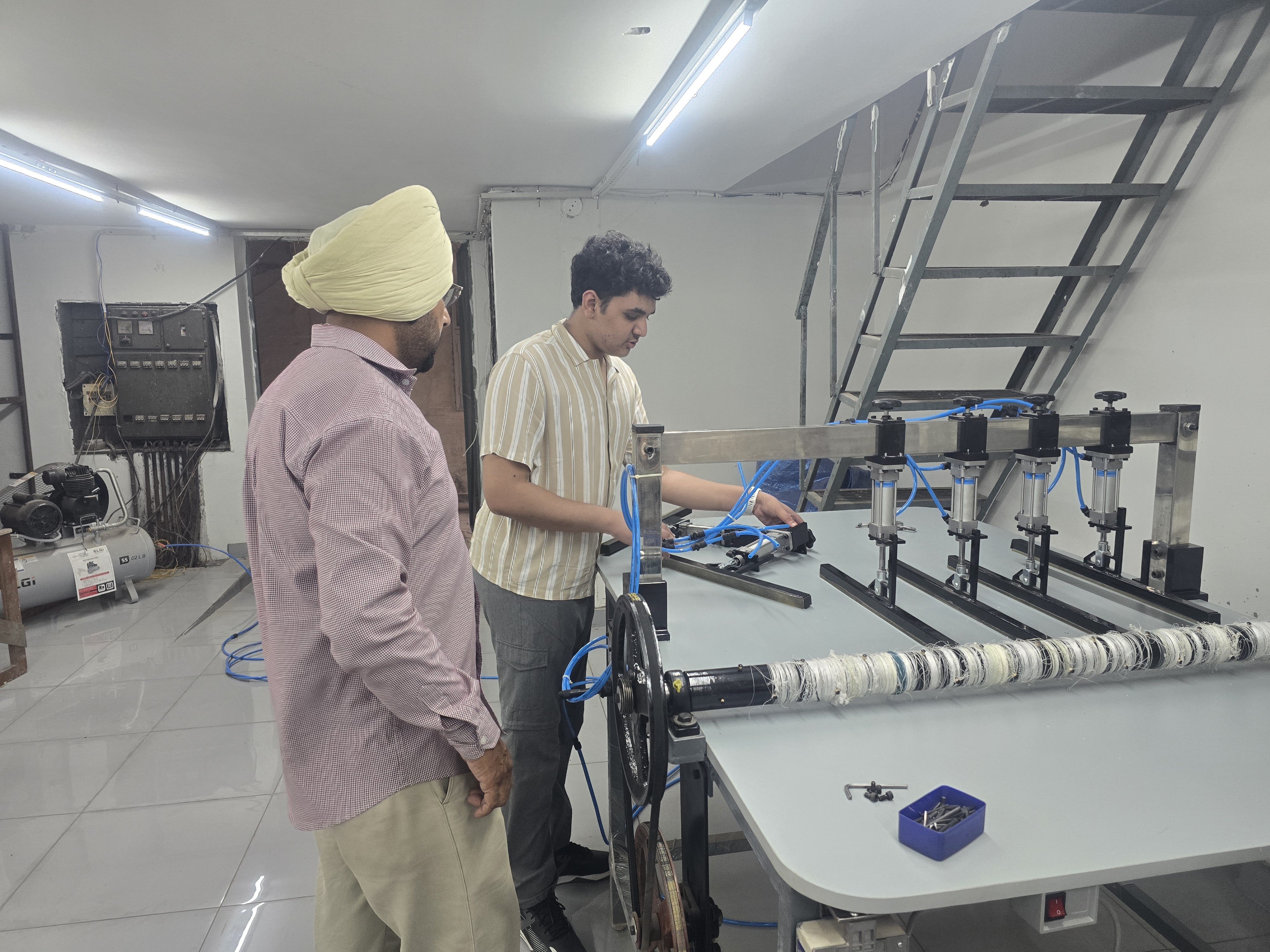At the machine with mentor