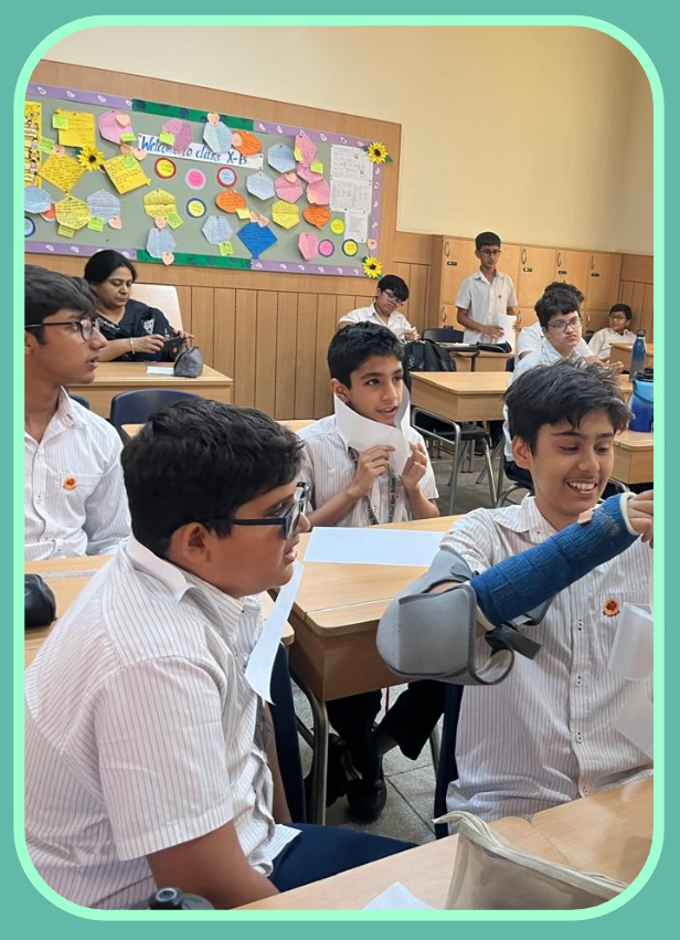 Students working through a Maths & Puzzles Society challenge